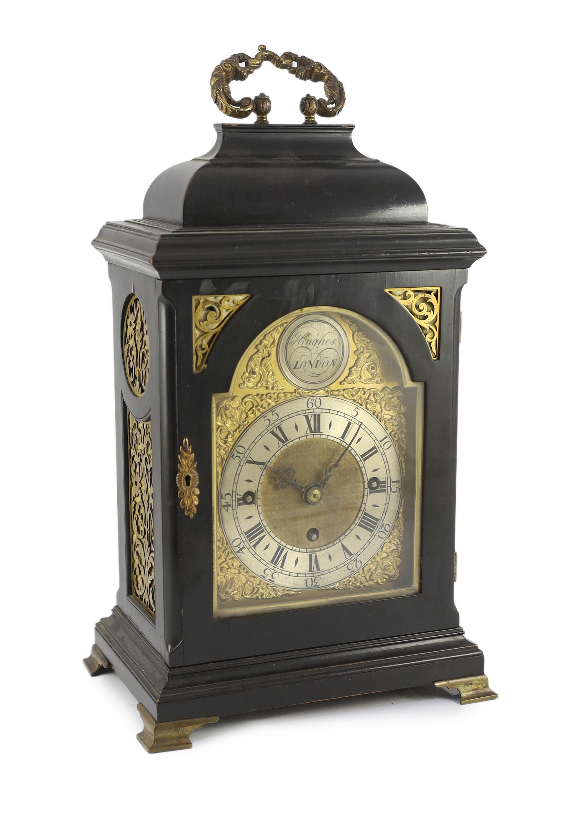 Hughes of London. A 19th century ebonised chiming bracket clock